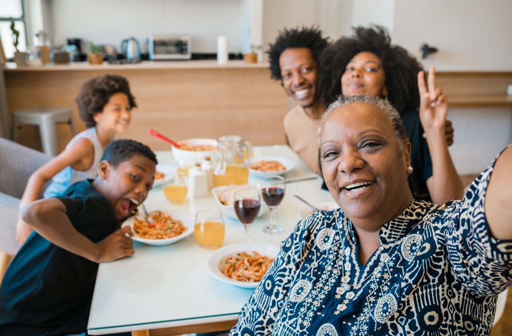 portrait-african-american-multigenerational-family-taking-selfie-together-while-having-dinner-home